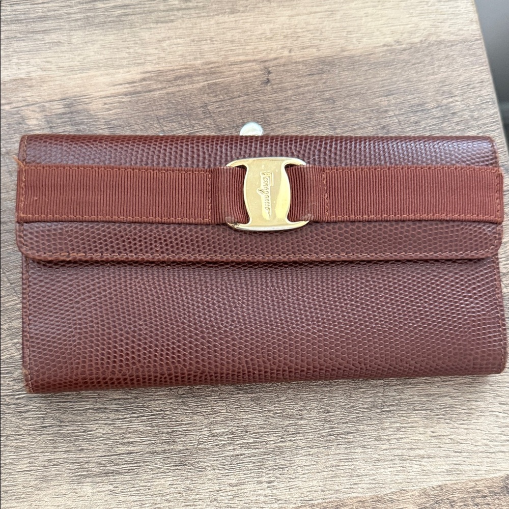 Salvatore Ferragamo Brown Textured Leather Bow Wallet with Gold Tone Logo